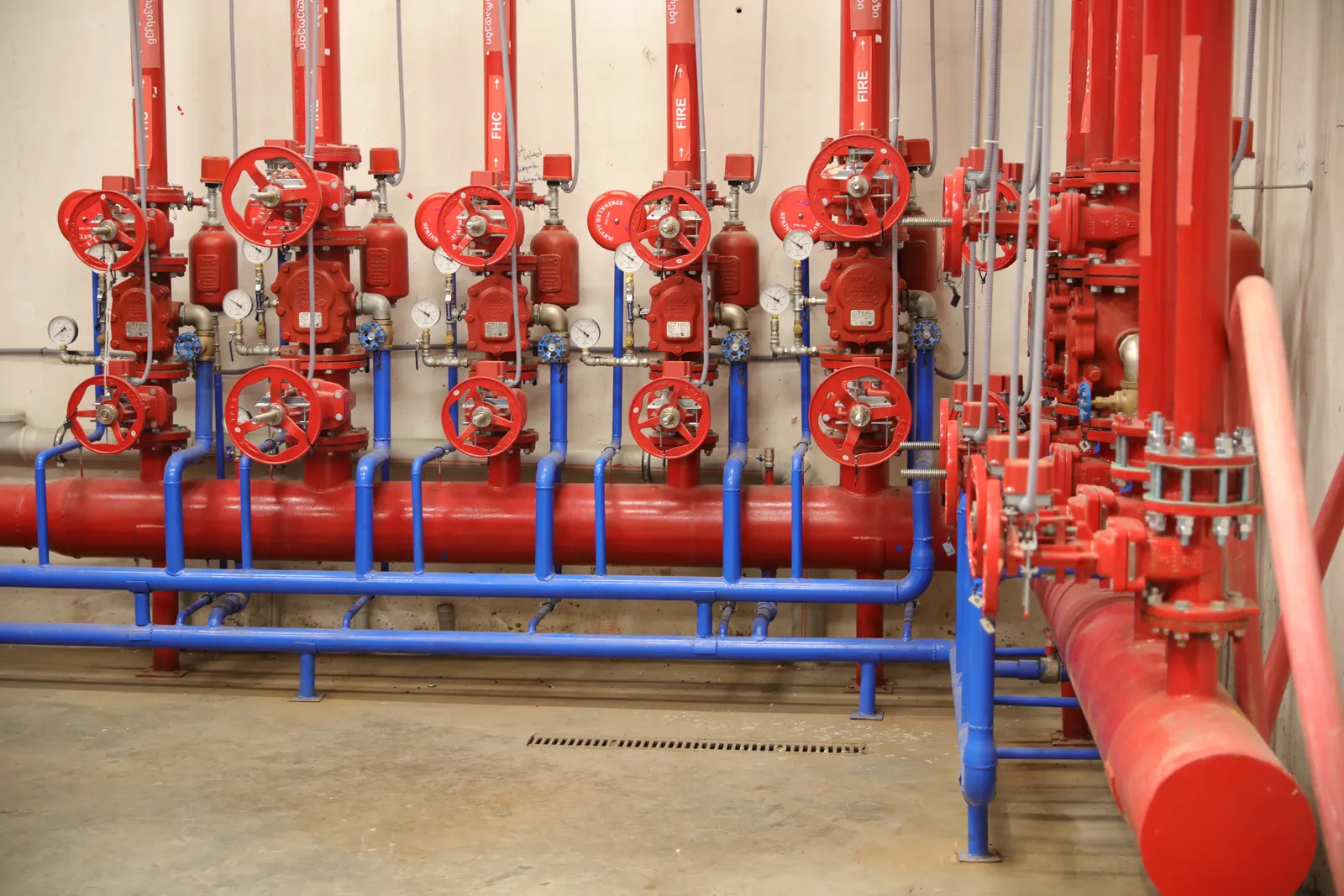 Fire pump room with red and blue pipes