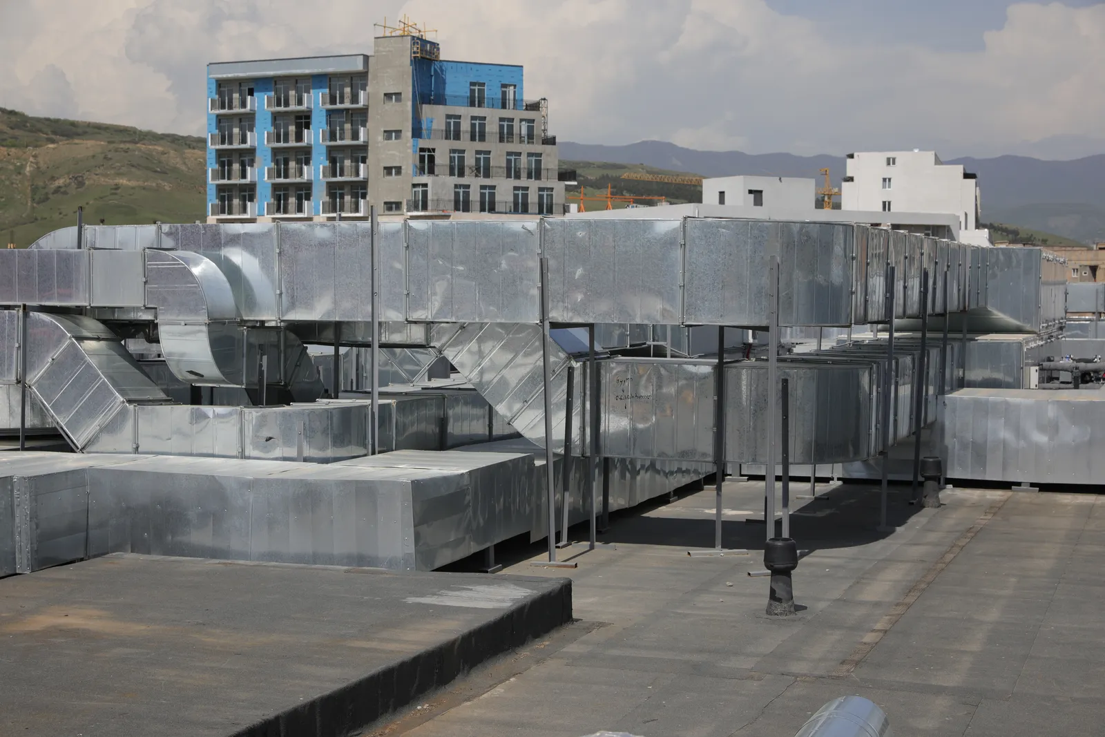 Rooftop HVAC units clear blue sky